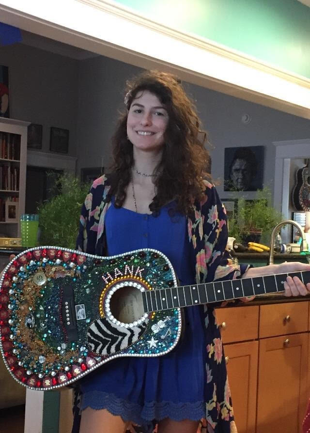 Ella with her guitar